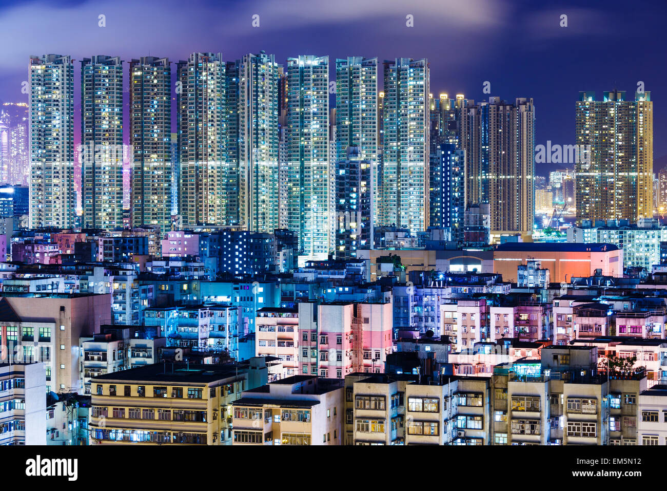 Apartment building in Hong Kong at night Stock Photo - Alamy