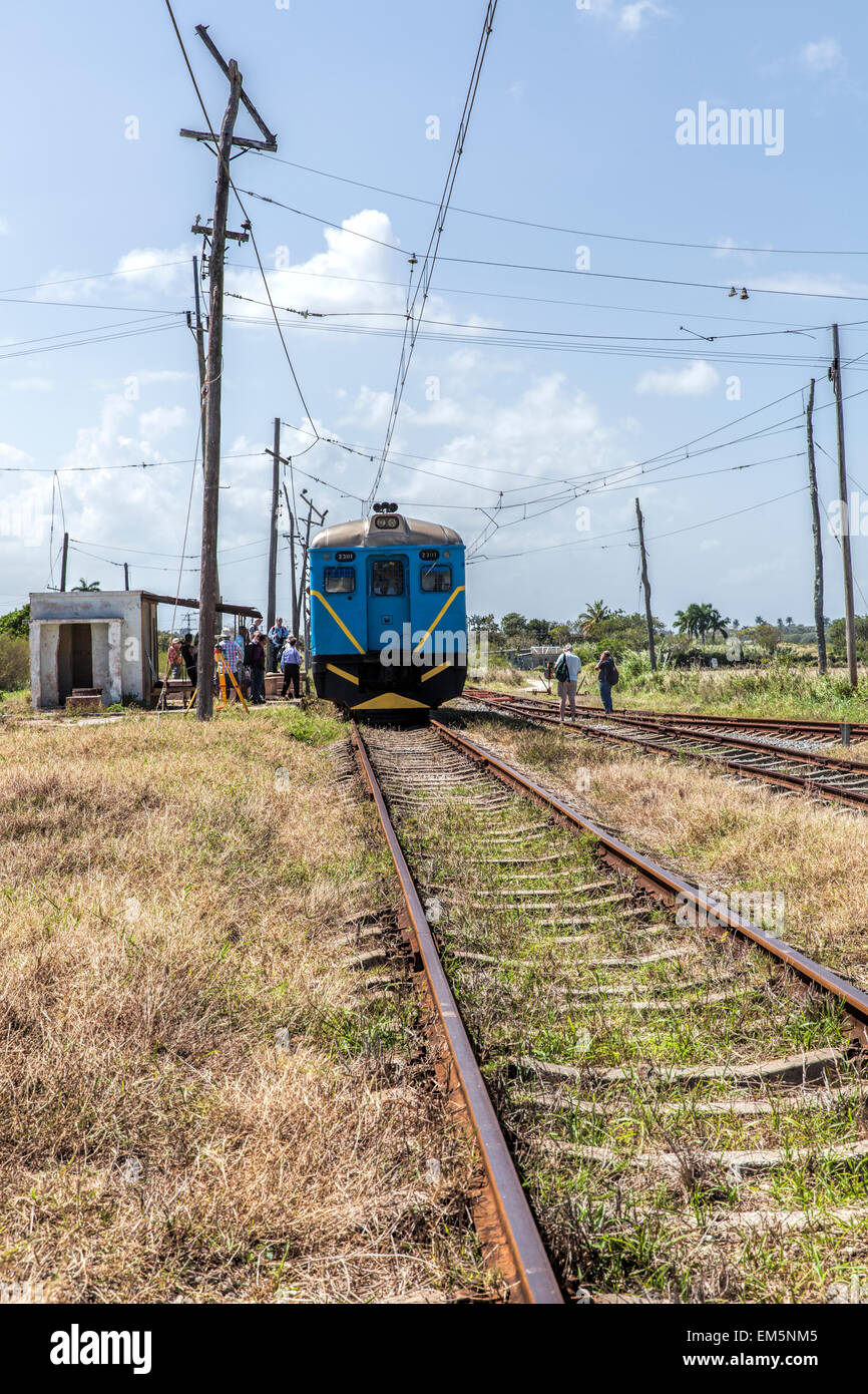 Diesel train and rusty railway track in a remote part of Cuba Stock Photo