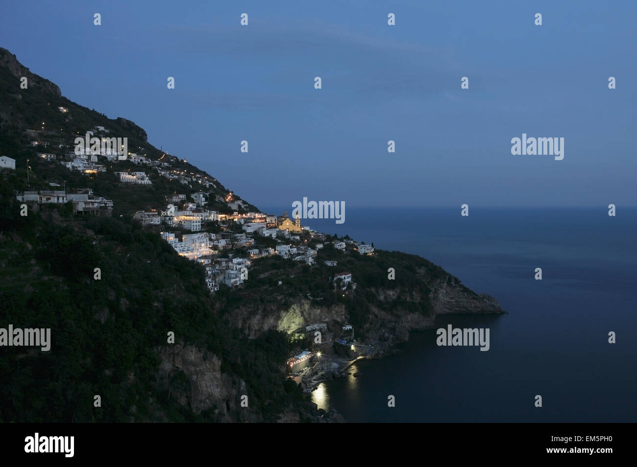 Italy, Salerno, Village along Amalfi coast at night; Positano Stock Photo