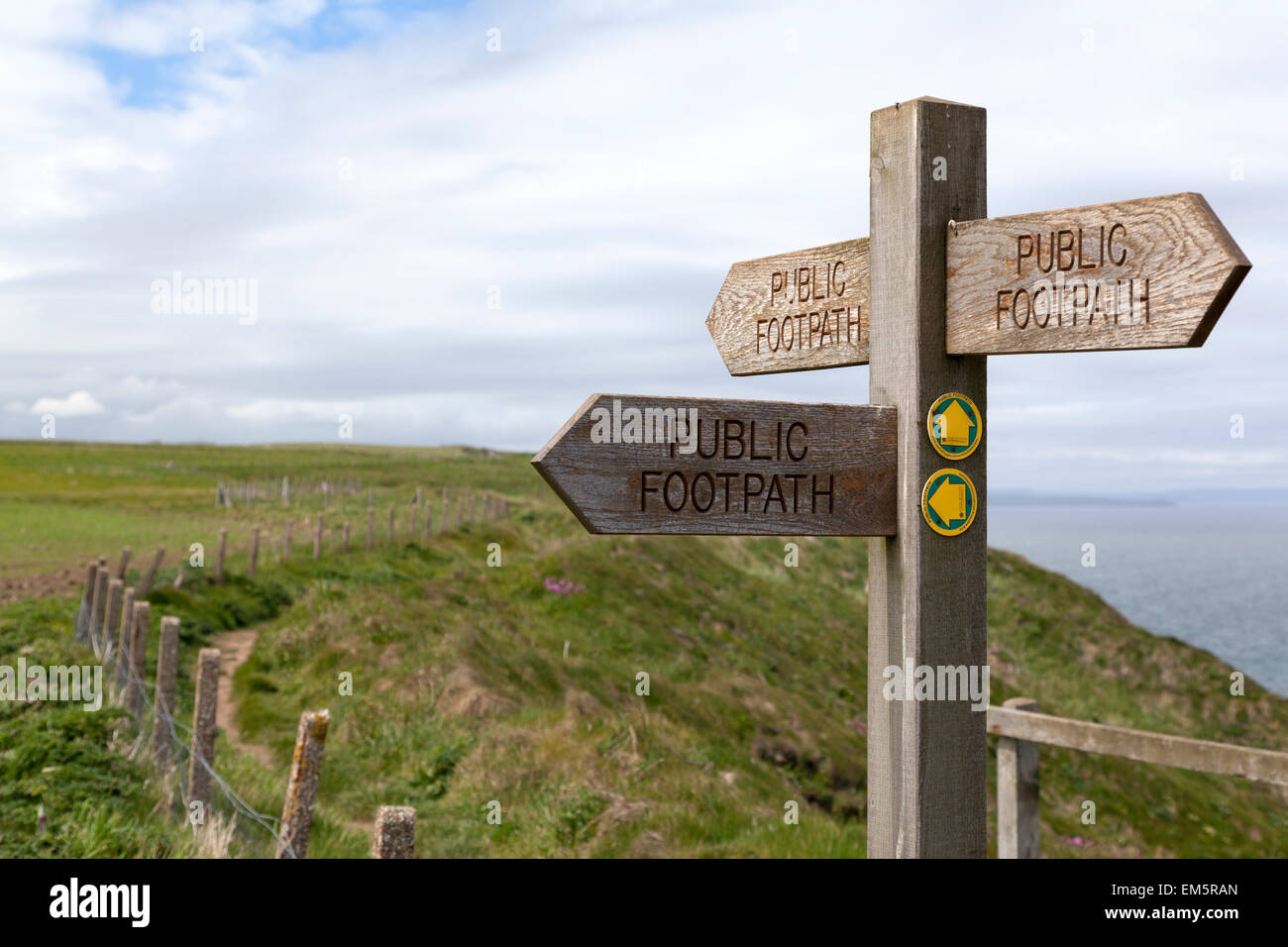 UK, Bempton Cliffs, footpath sign along the coastal path. Stock Photo