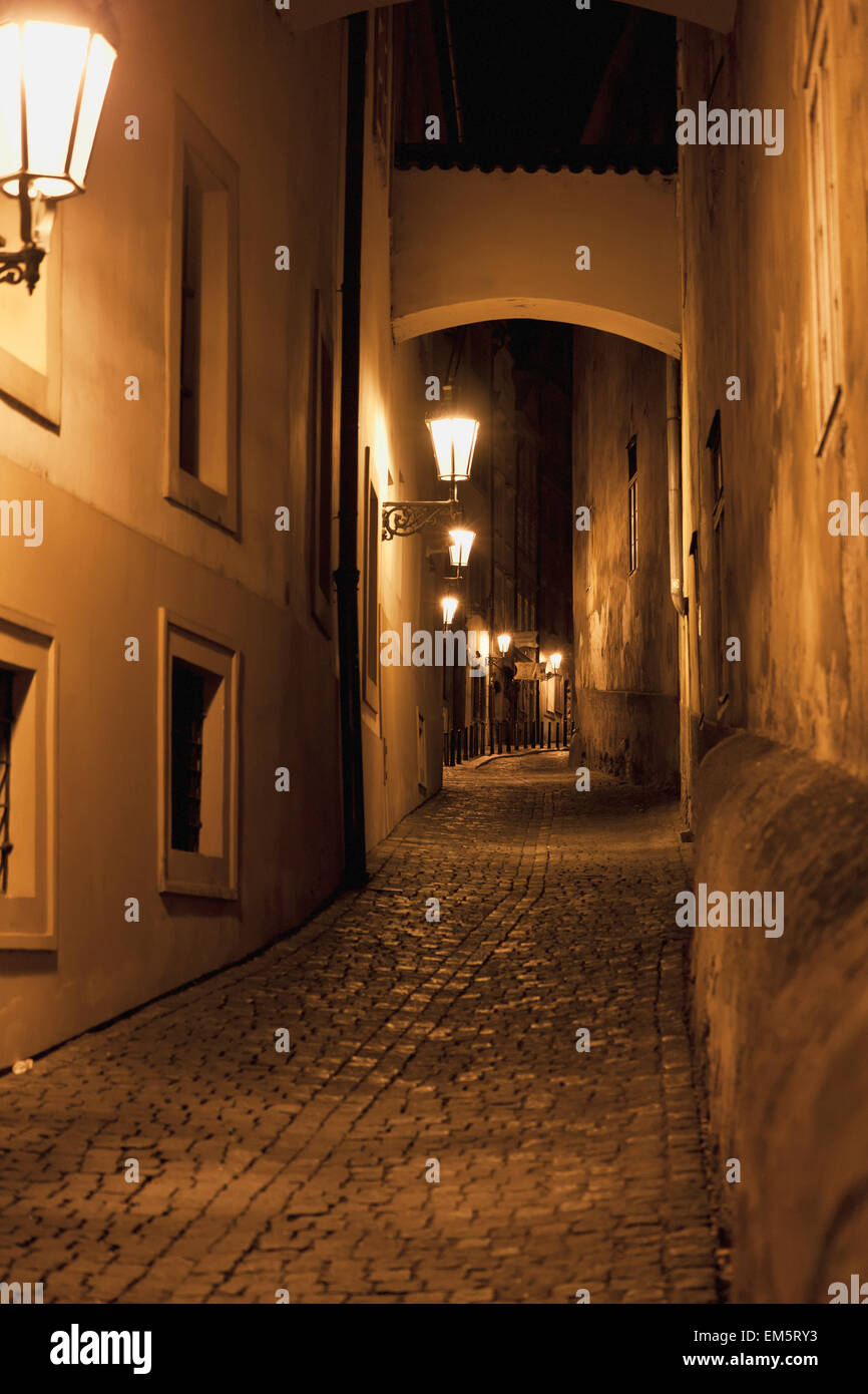 Czech Republic, Alley illuminated by lights at night; Prague Stock Photo Alamy