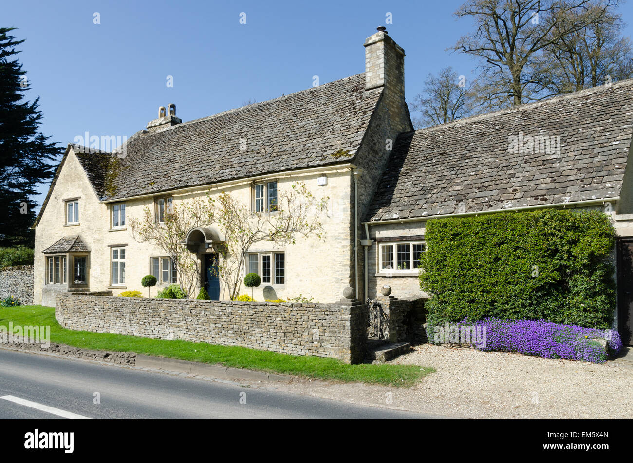 Pretty Cotswold house in the village of Barnsley near Cirencester Stock Photo
