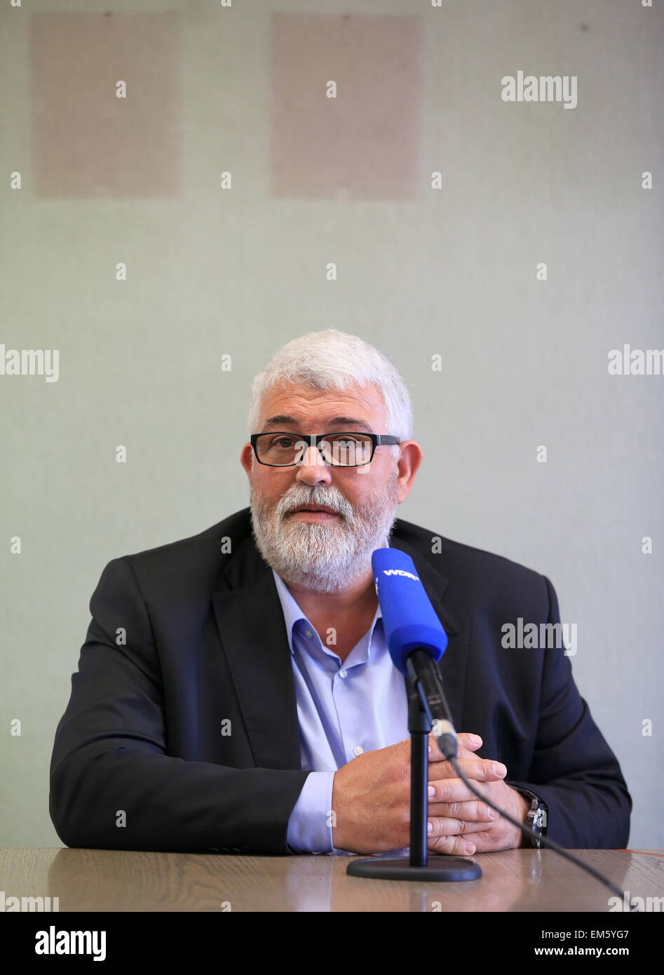 Marti Pujol Kasals, Mayor of Llinars del Vallesm speaking at a press conference in Haltern am See, Germany, 16 April 2015. Before the memorial ceremony for plane crash victims, the mayor is meeting guests from the spanish twin town in Haltern. 16 pupils and 2 teahers from the German school were returning from an exchange trip near Barcelona on the Germanwings plane that crashed on 24 March. PHOTO: MARCEL KUSCH/dpa Stock Photo