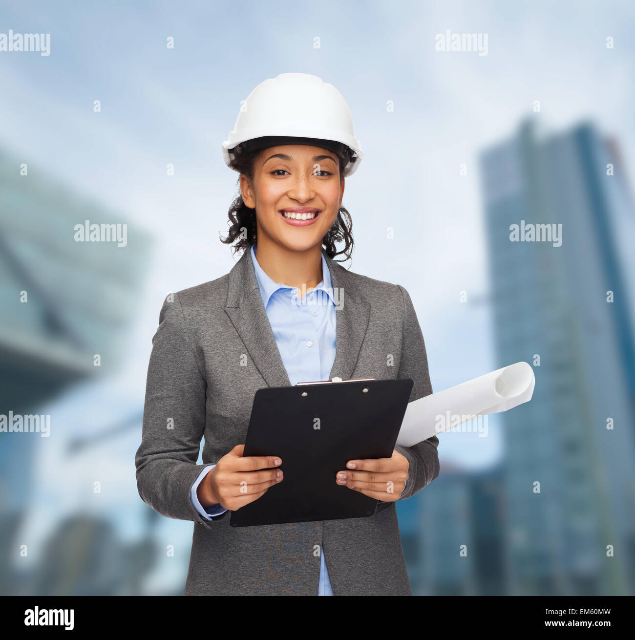 businesswoman in white helmet with clipboard Stock Photo - Alamy