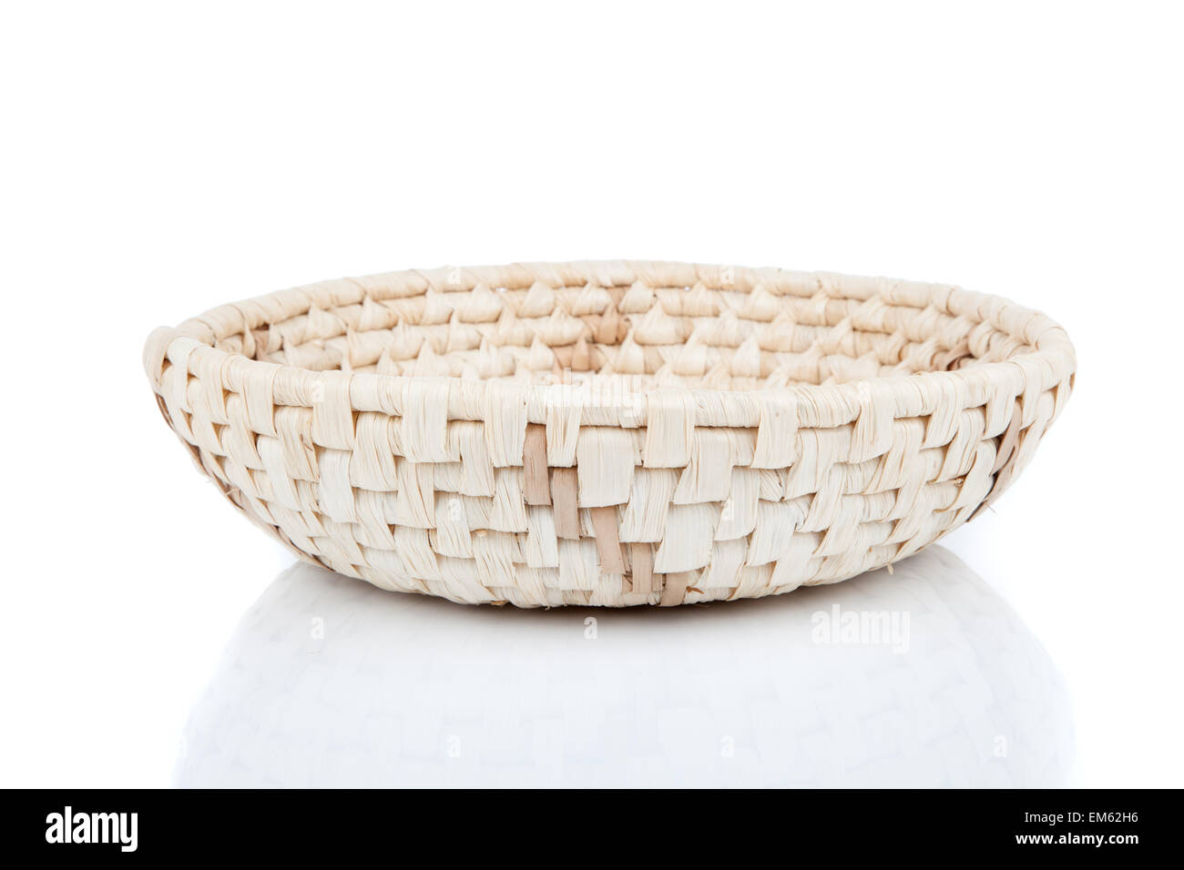 wicker basket, isolated on a white background Stock Photo - Alamy