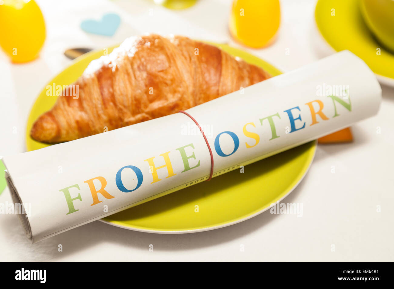 Happy Easter Newspaper on breakfast table Stock Photo Alamy