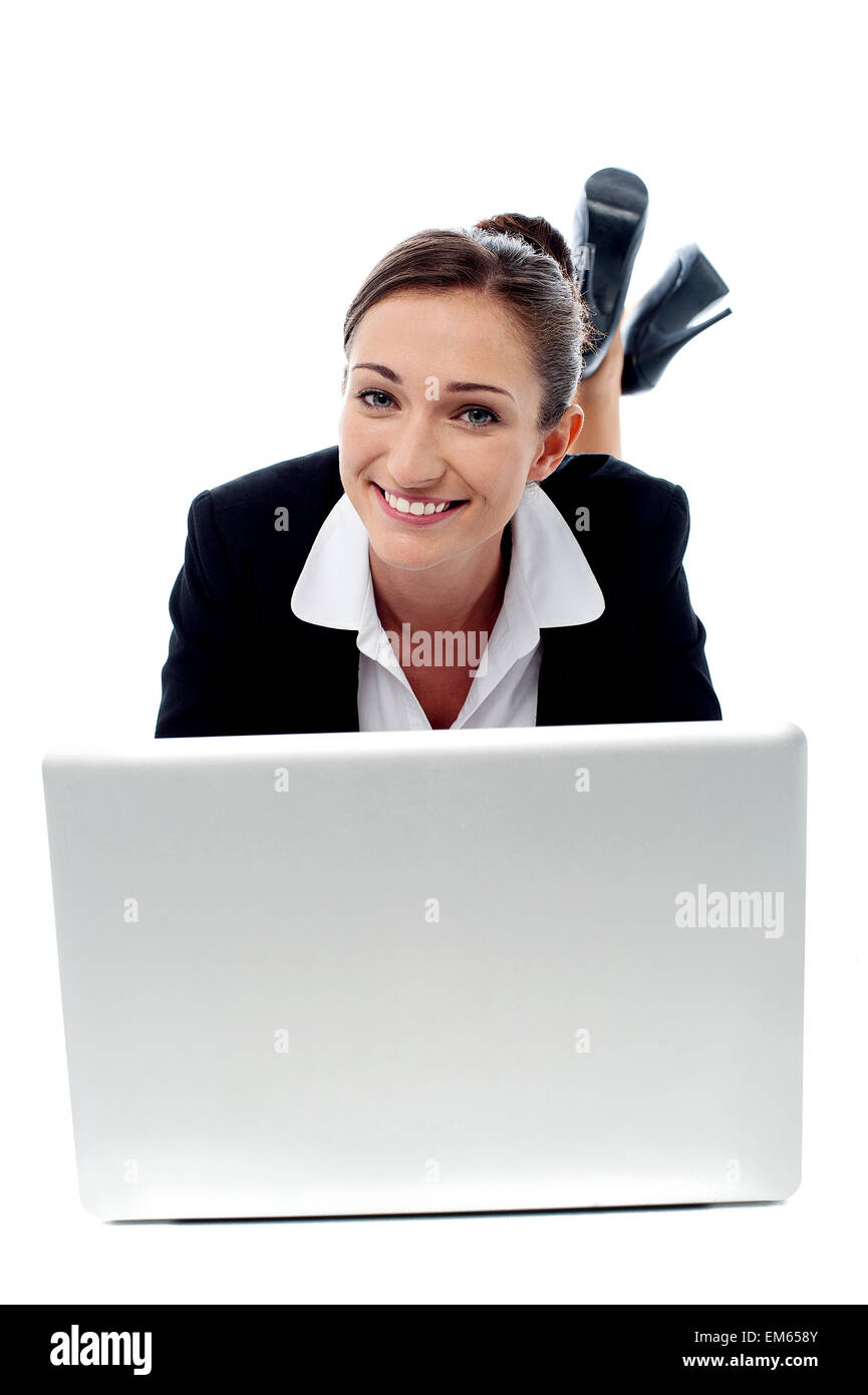 Office woman lying down on floor and working Stock Photo Alamy