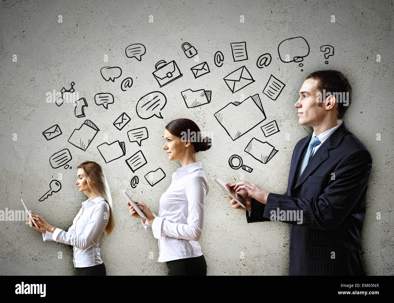 Three young people in business suits Stock Photo - Alamy