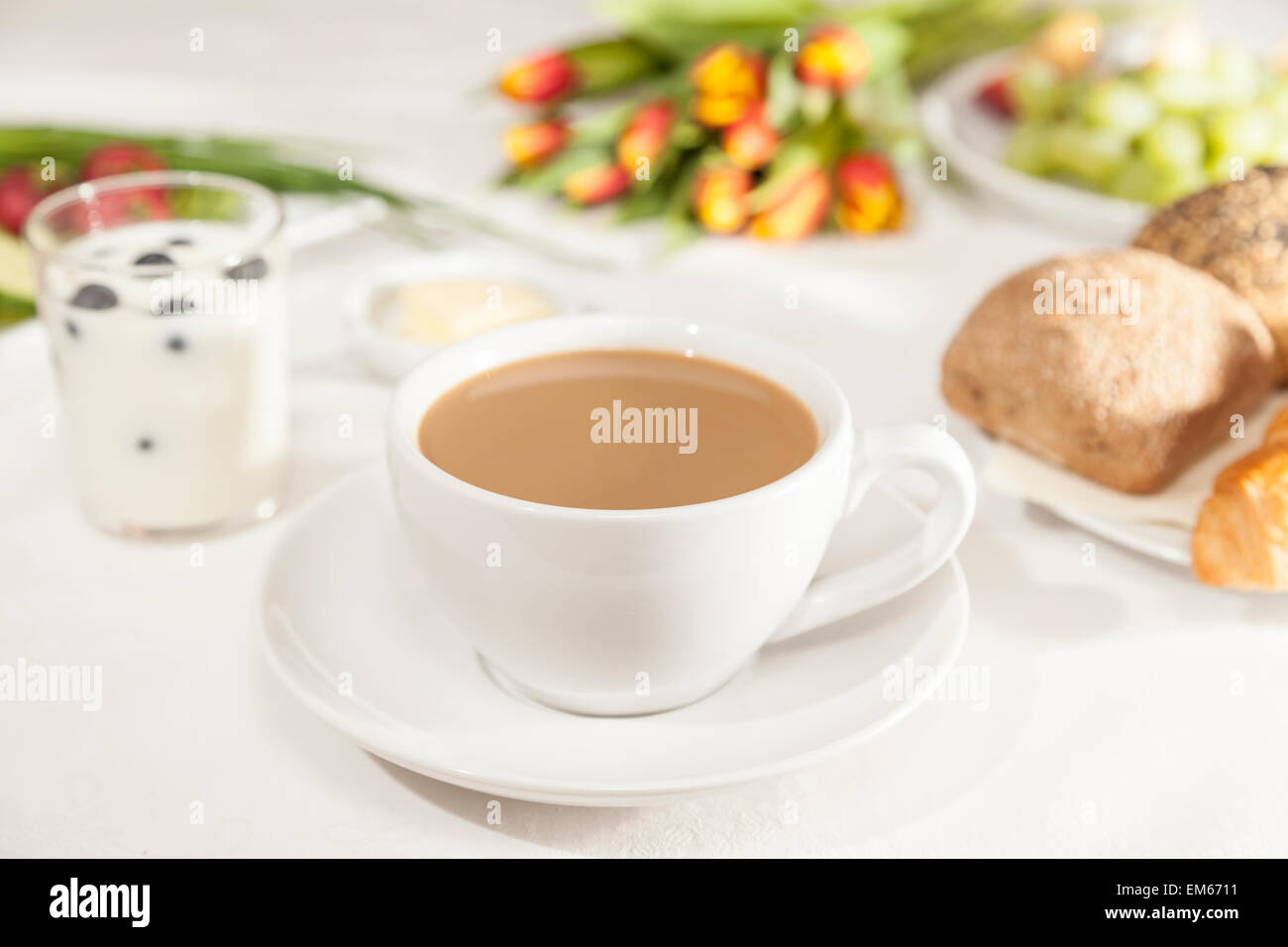 White coffee on breakfast table Stock Photo