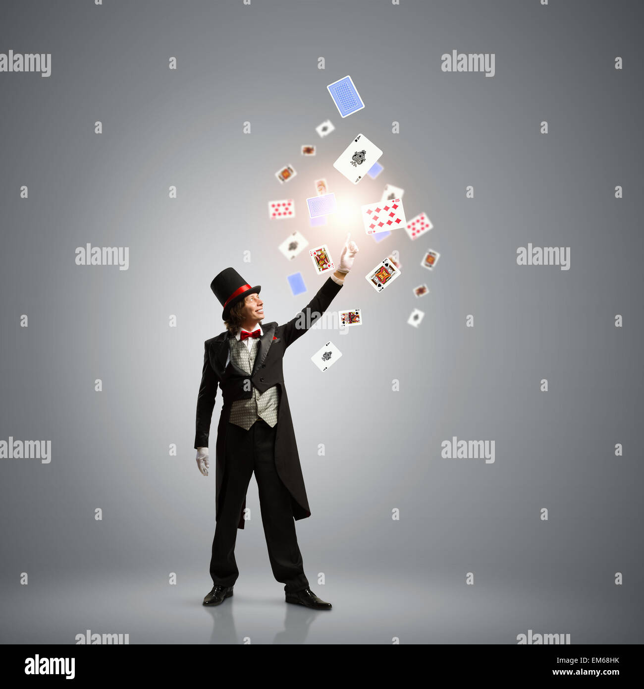 Magician with cards Stock Photo Alamy