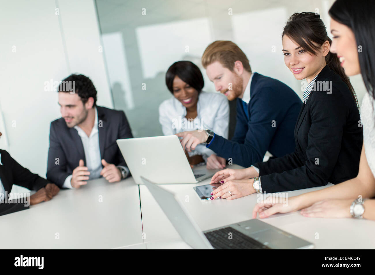 Young people working in the office Stock Photo - Alamy