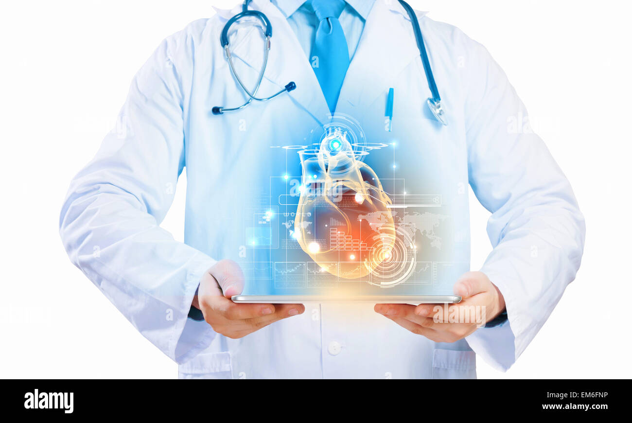 Doctor holding tablet pc Stock Photo - Alamy