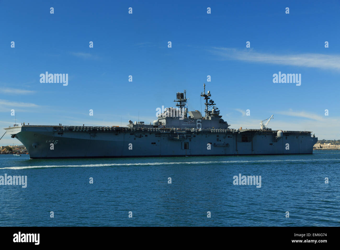 A photograph of the USS America (LHA-6), in San Diego Bay, as seen from Seaport Village. Stock Photo