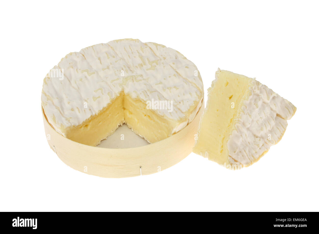 Camembert cheese in a round box with a wedge cut out isolated against white Stock Photo