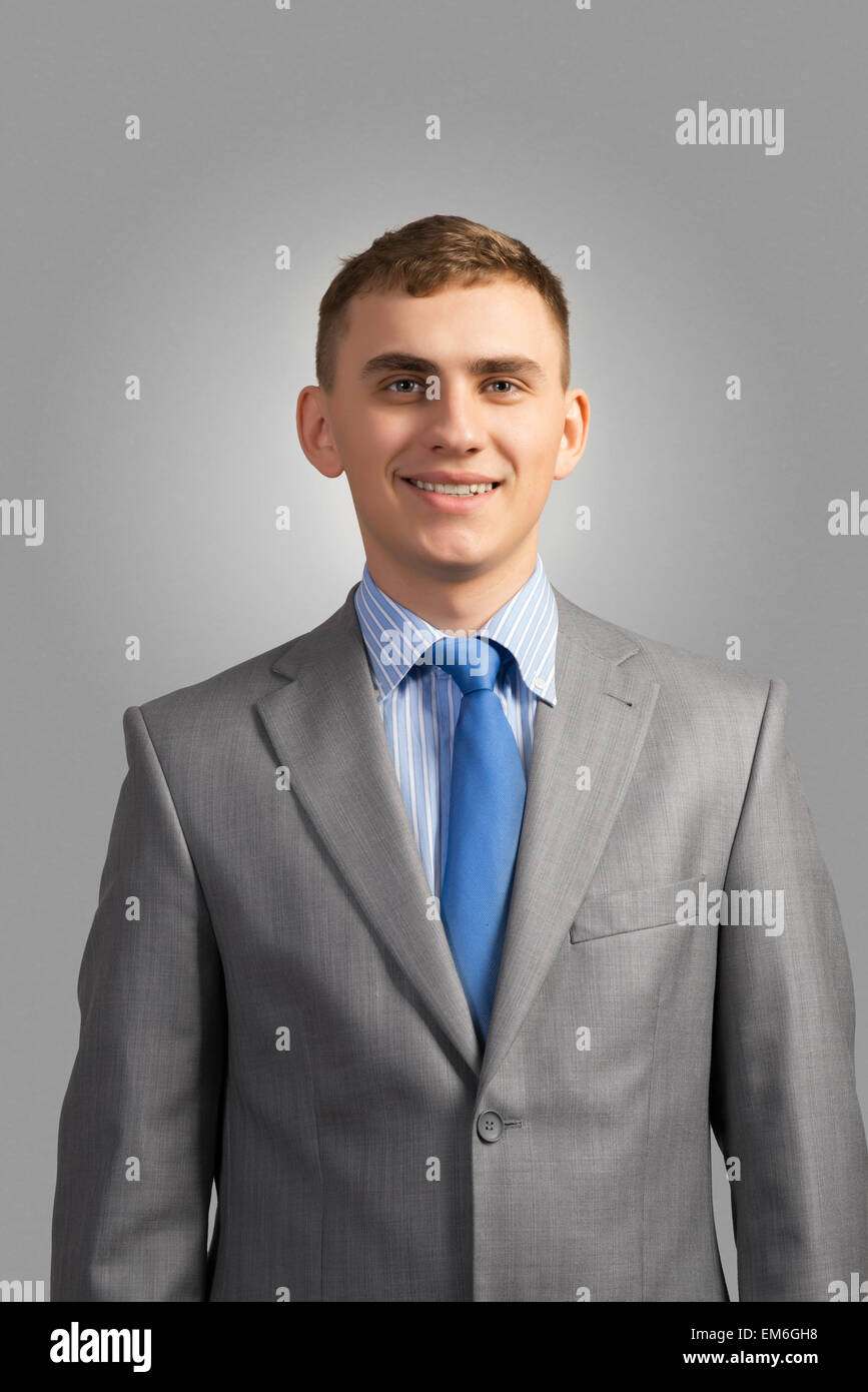 Portrait of a young businessman Stock Photo - Alamy
