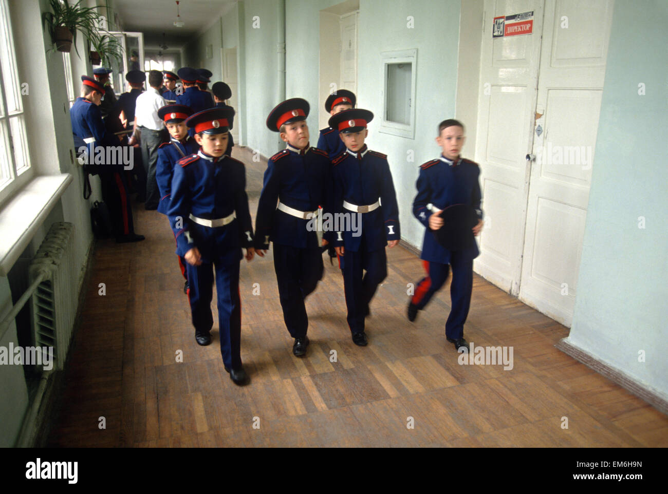 Young Russian Don Cossacks in traditional Cossack uniform walk through the halls of their school on the way to class at the Don Cossack Military School in Novocherkassk, Russia. Stock Photo