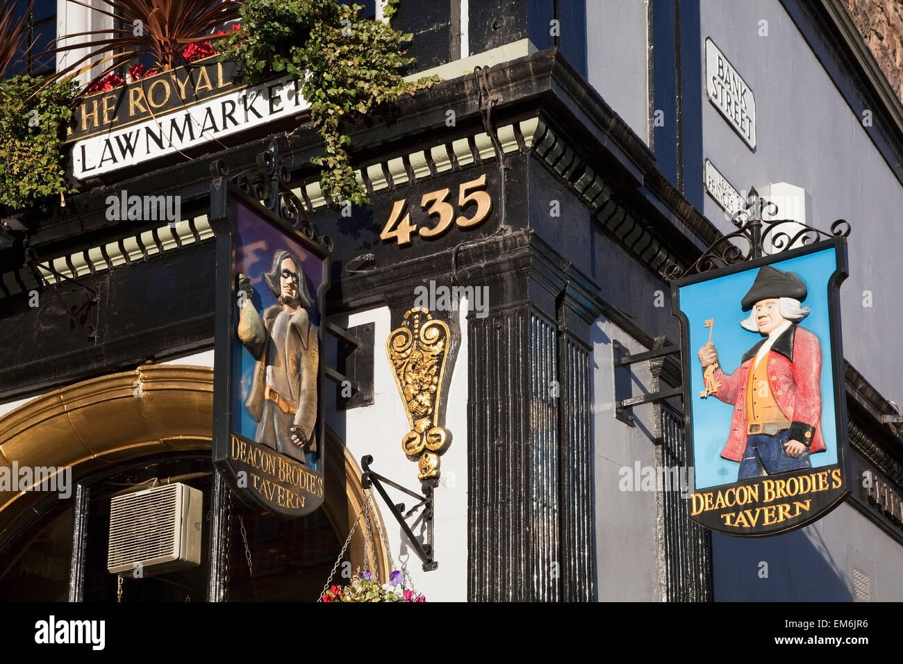 United Kingdom, Scotland, Low angle view of commercial signs of traditional pub on Lawnmarket; Edinburgh Stock Photo