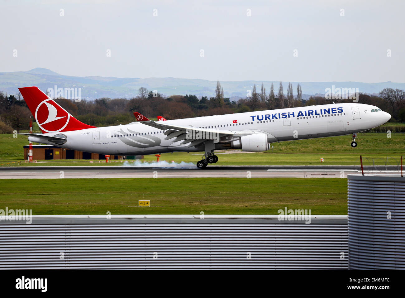 Turkish Airlines Airbus A330-300 touches down on runway 23R at Manchester  airport Stock Photo - Alamy