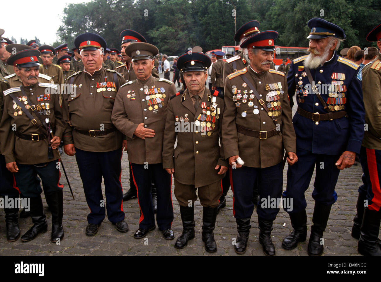 Russian Don Cossacks stand at attention during a blessing at the Ascension Cathedral in Novocherkassk, Russia. The men are participating in the annual Cossack Festival gathering of units from around Russia. Stock Photo