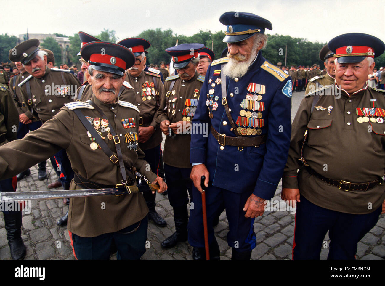 Russian Don Cossacks veterans of World War II in uniform before a blessing at the Ascension Cathedral in Novocherkassk, Russia. The men are participating in the annual Cossack Festival gathering of units from around Russia. Stock Photo