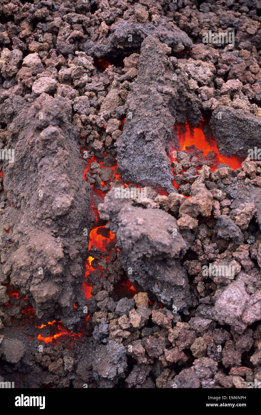 USA, Hawaii, Big Island, USA Volcanoes National Park; Kilauea, Hawaii, East Rift Zone, Close-Up Of Lava Flow Under Rocks Stock Photo