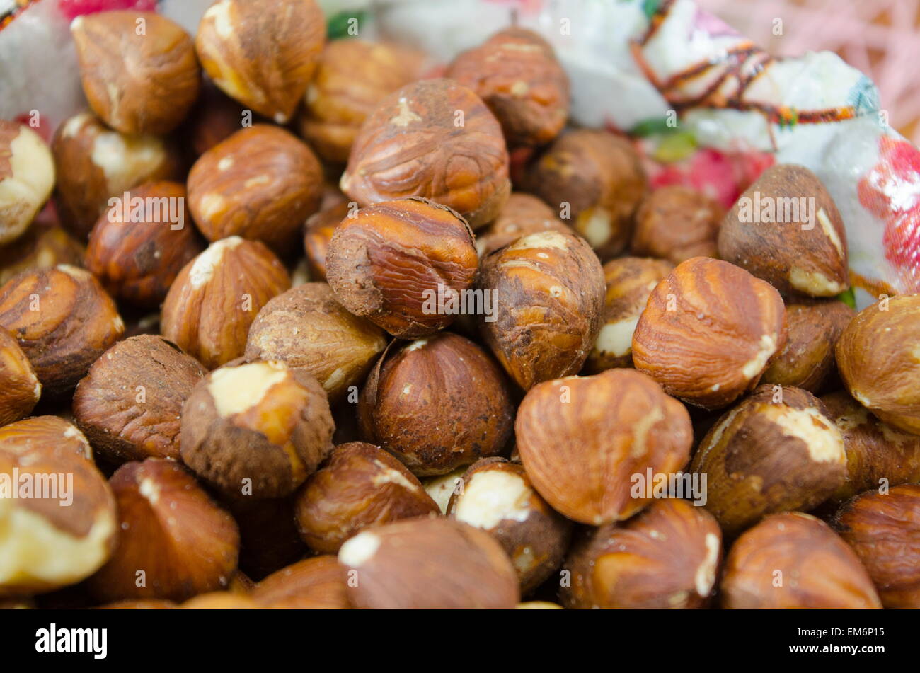 Bunch of raw hazelnuts on a plate Stock Photo