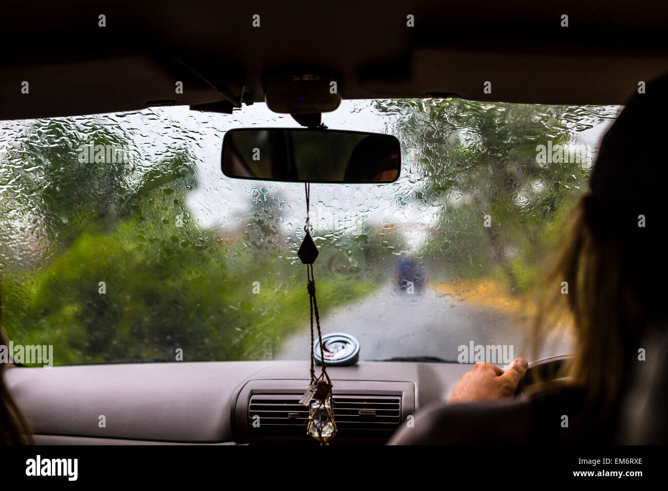 The raining weather on the way, travelling by car. Stock Photo
