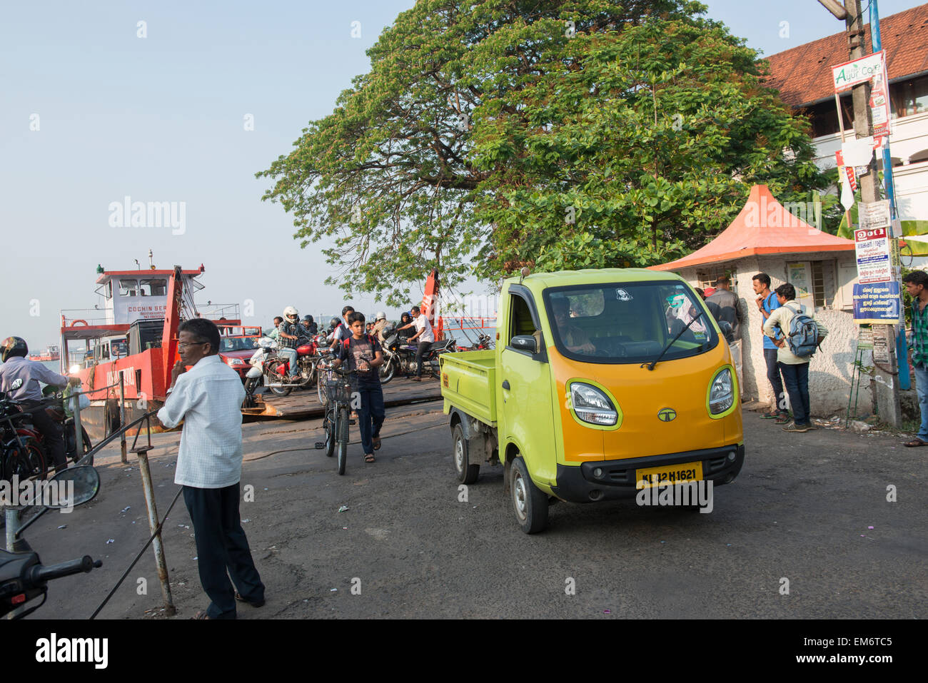 People getting off a passenger ferry in Fort Kochi, Kerala India Stock Photo