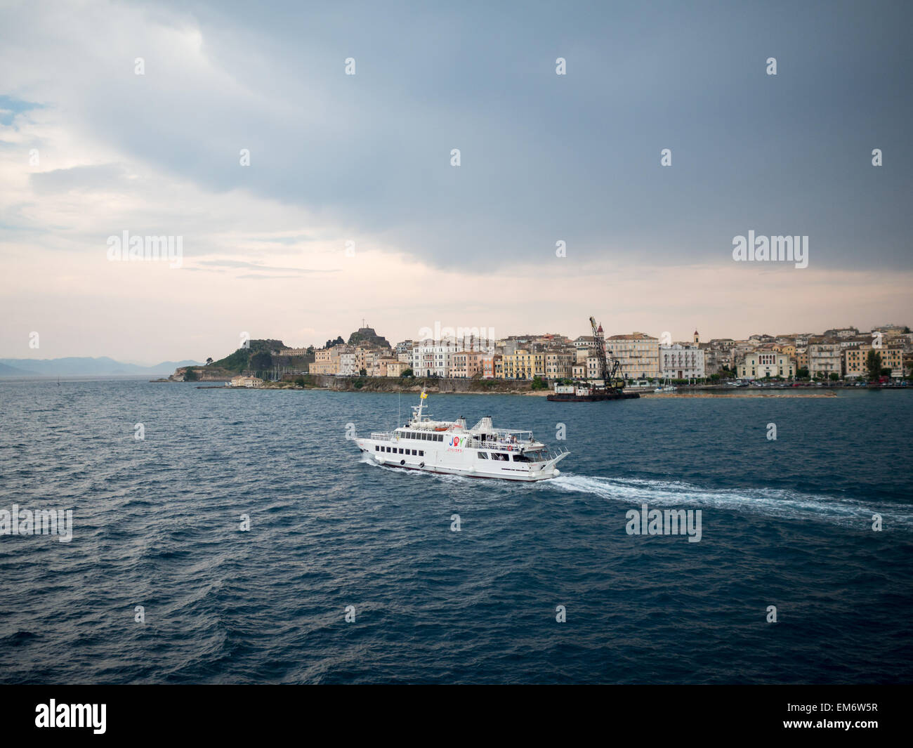 Jetfoil passing by Corfu town seafront Stock Photo