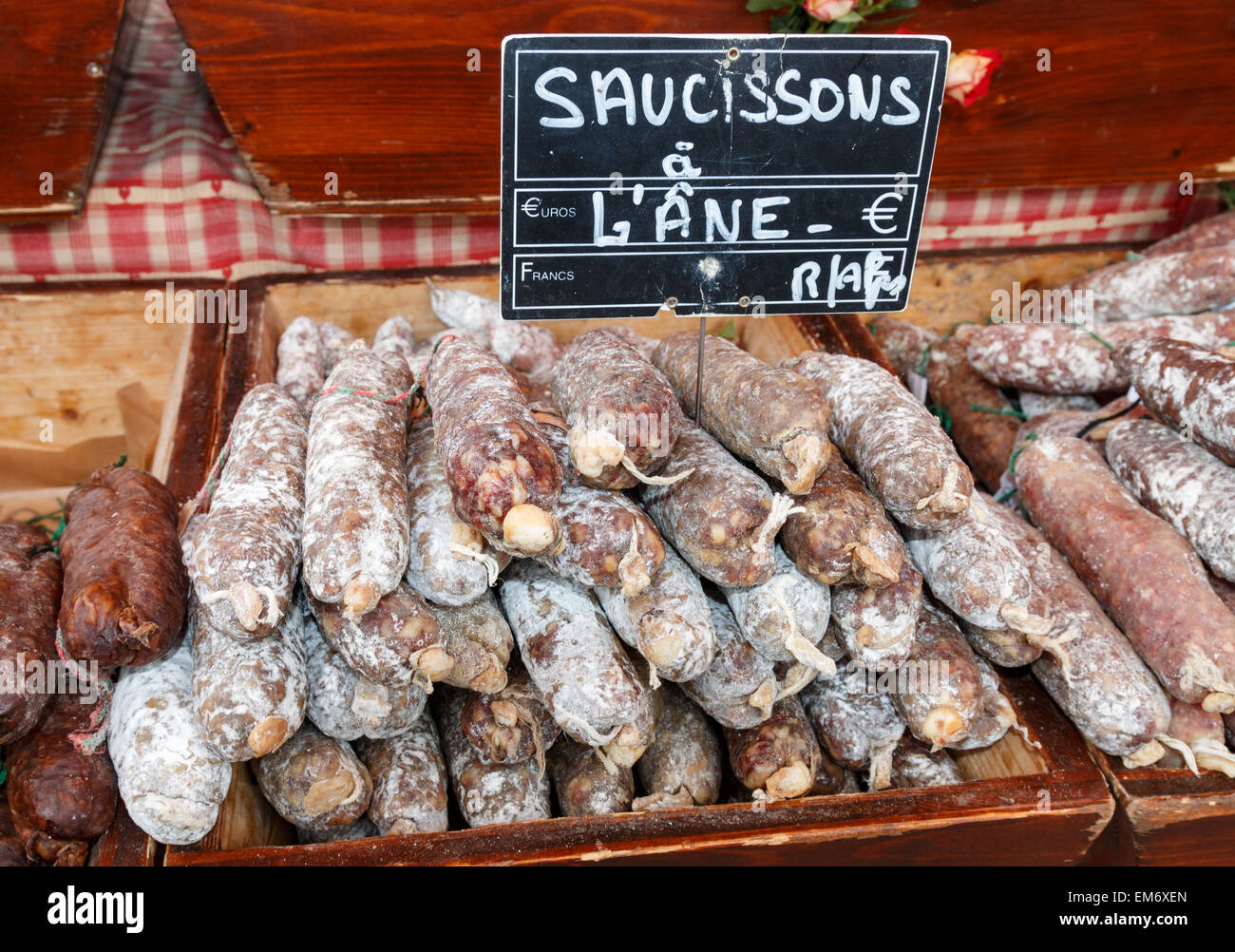 Donkey sausage for sale at a French market. The donkey sausages have