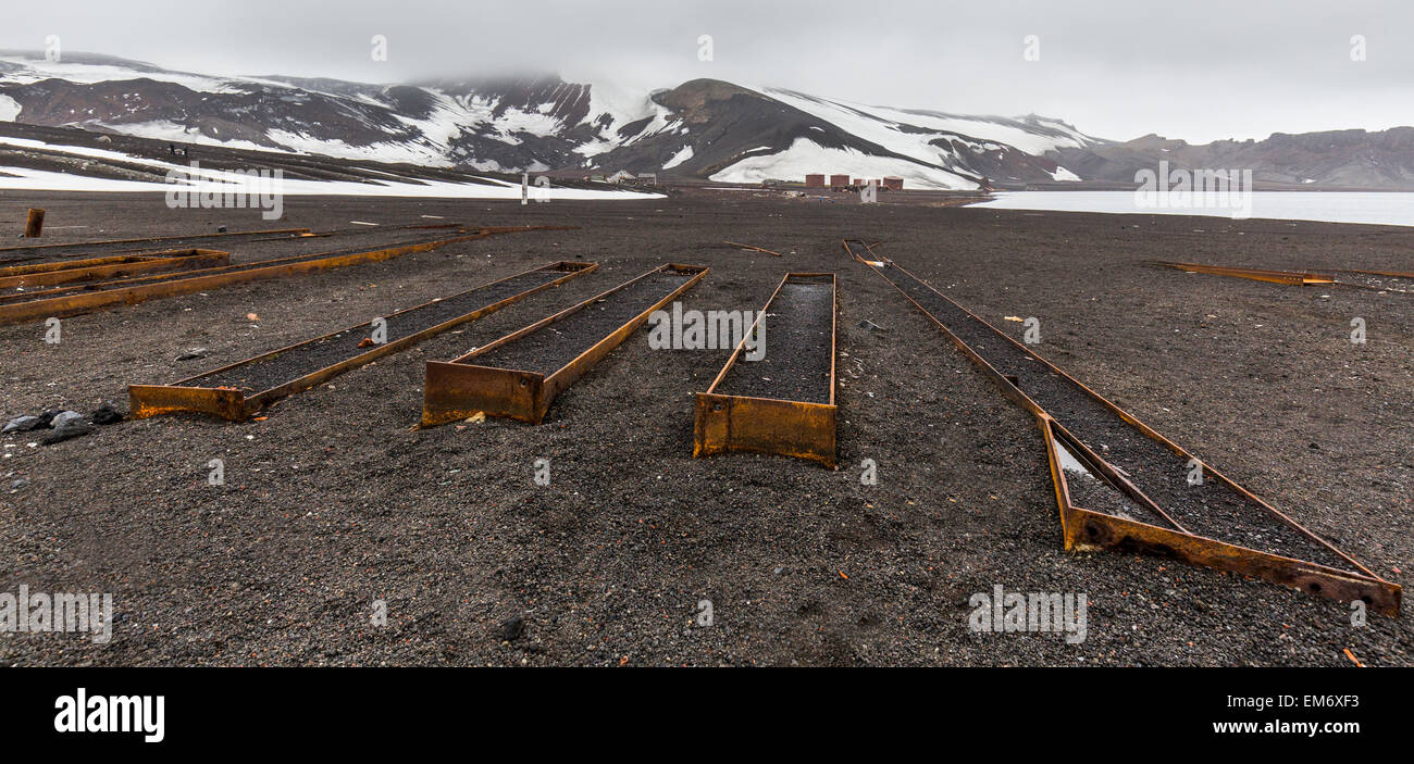 ruined iron girders on sand, Whaler's Bay, Deception Island, Antarctica Stock Photo