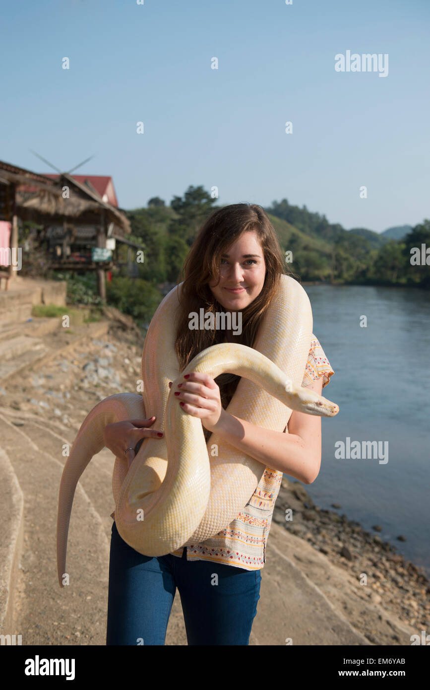 Girl holding a python; Thaton, Chiang Rai, Thailand Stock Photo - Alamy