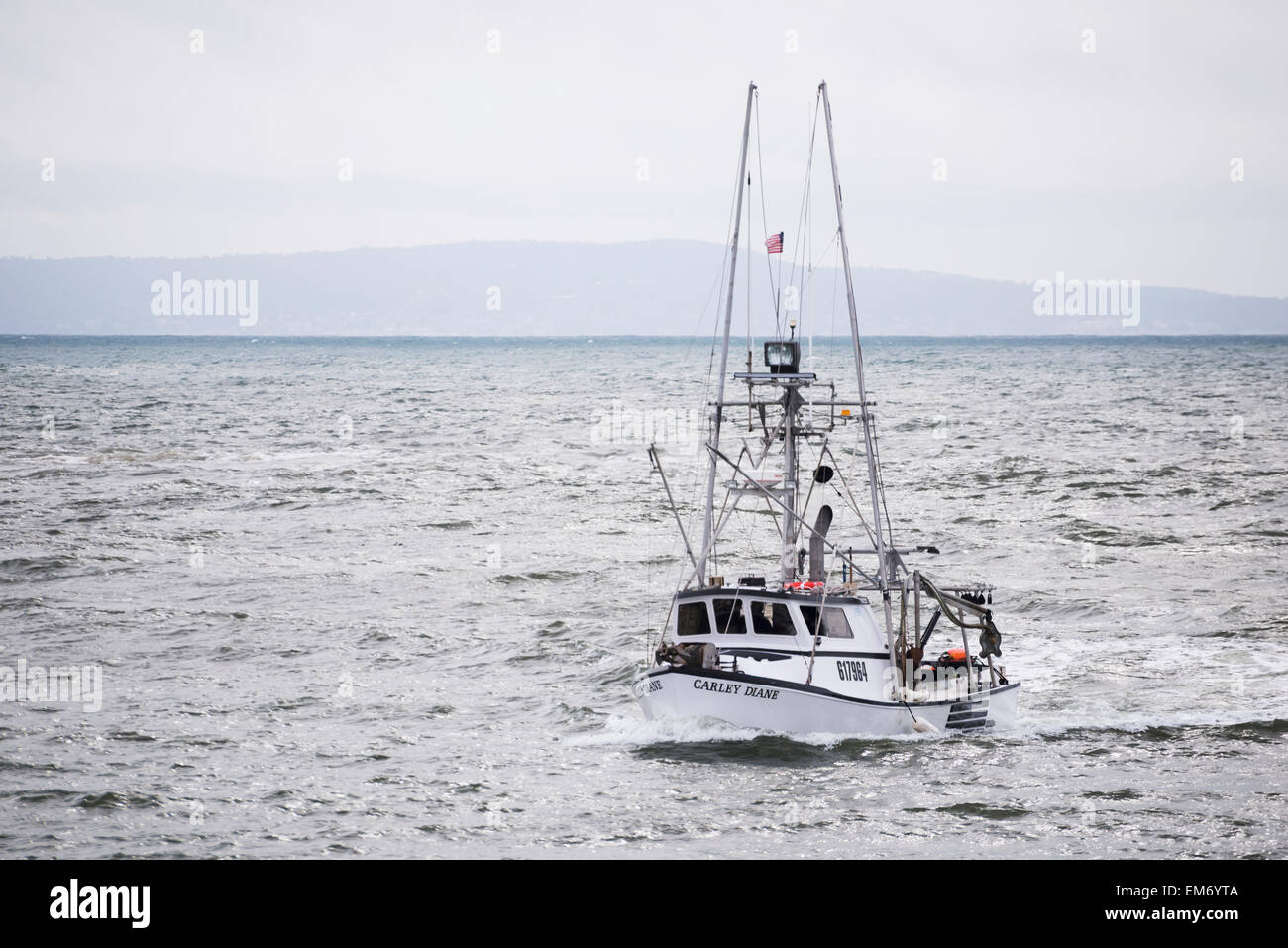 Troller entering Moss Landing Harbour area; Monterey Bay, California