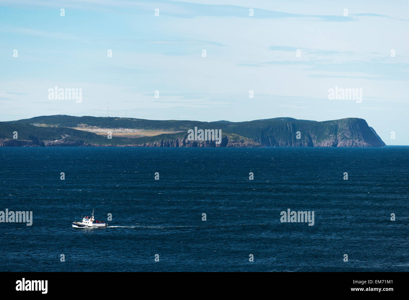 A boat on the water in Cape Spear; St. John's, Newfoundland and Labrador, Canada Stock Photo