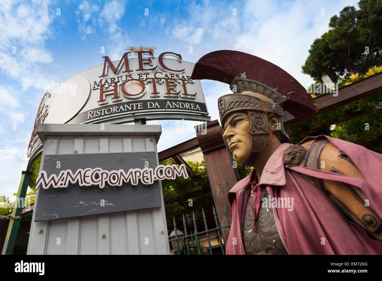 Hotel and statue of soldier; Pompei, Italy Stock Photo