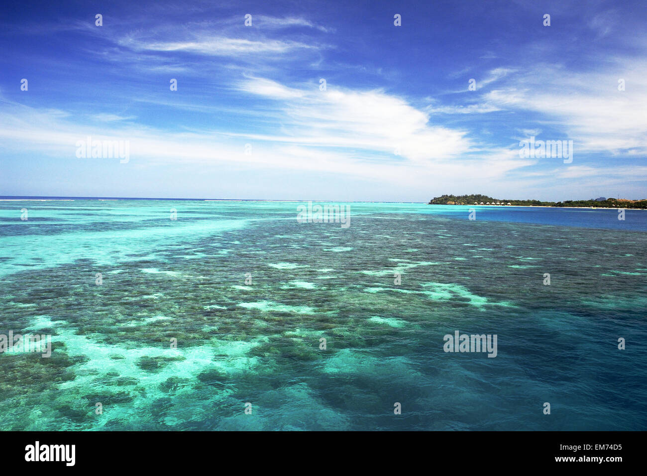 Fiji, View from ocean to Mana Island; Mamanuca Islands Stock Photo