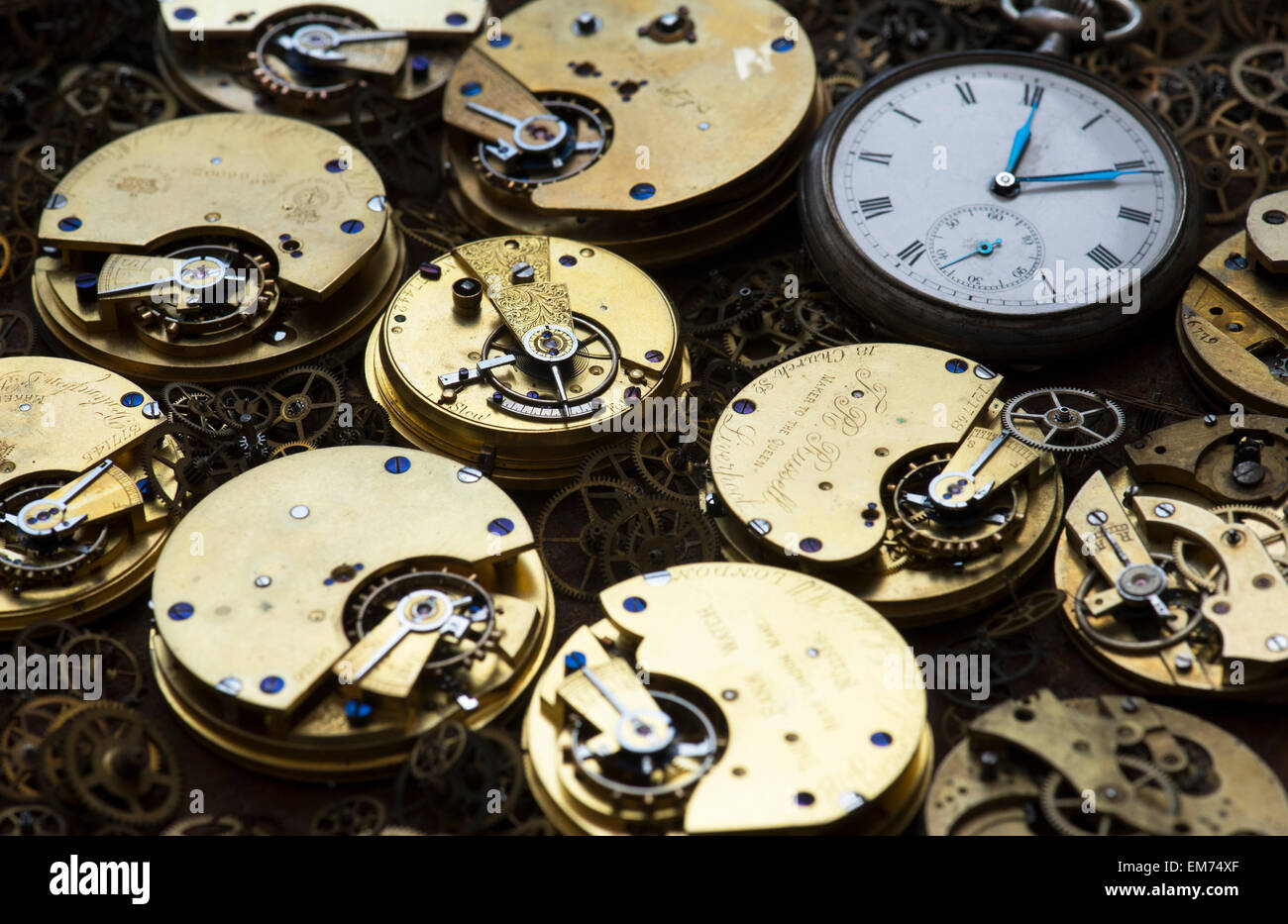 Old pocket watches, movements and cogs Stock Photo