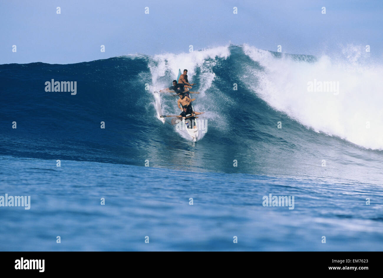 Hawaii, Oahu, Makaha, Frontal View Of Men In Outrigger Canoe Surfing