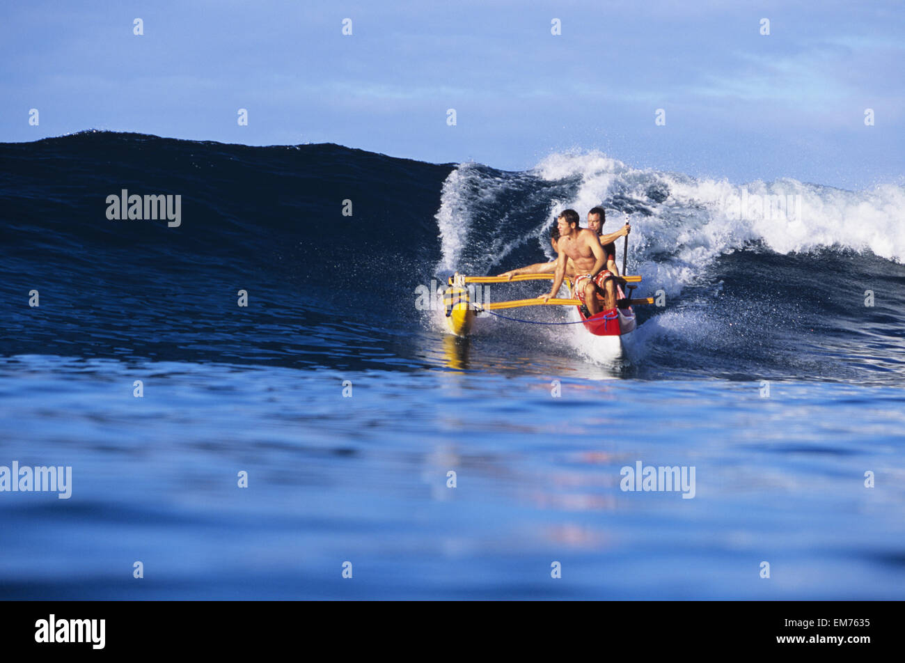 Hawaii, Oahu, Makaha, Men In Outrigger Canoe Surfing Wave, View From