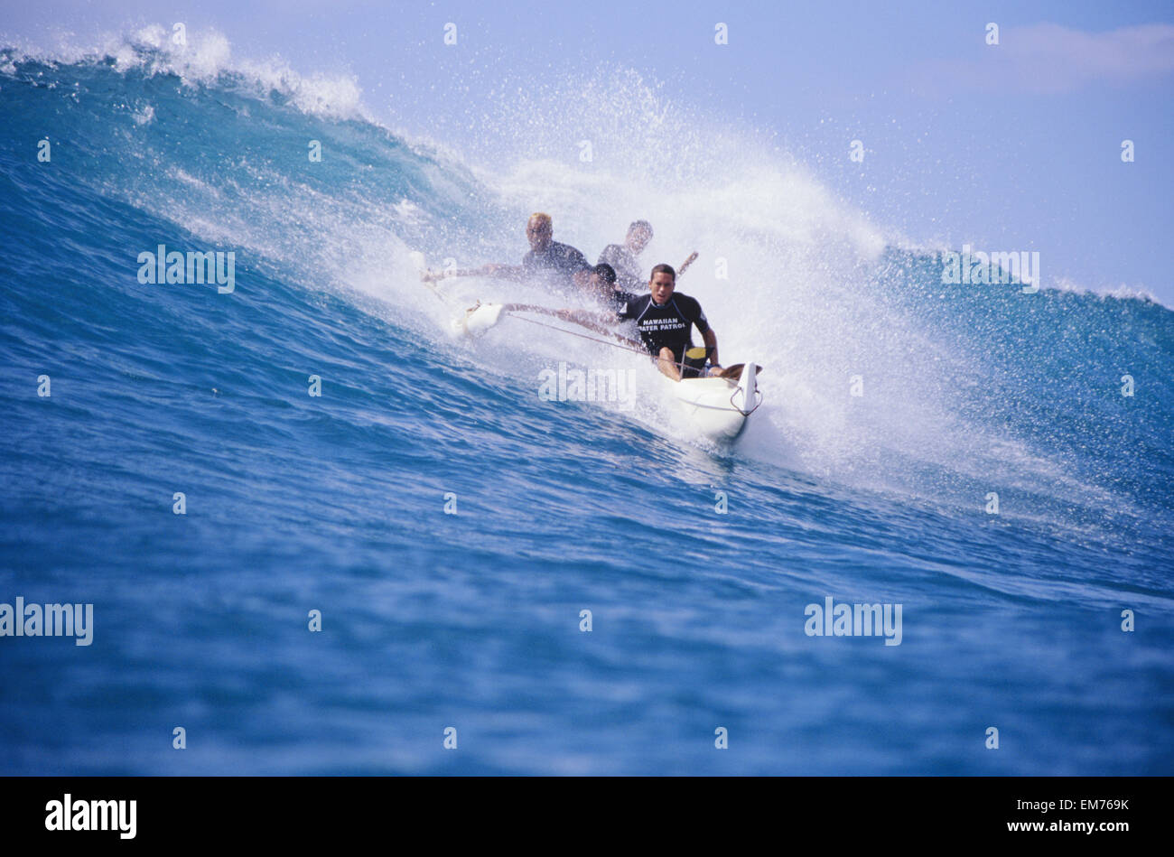 Hawaii, Oahu, Makaha, Men Surfing Wave In White Outrigger Canoe, View