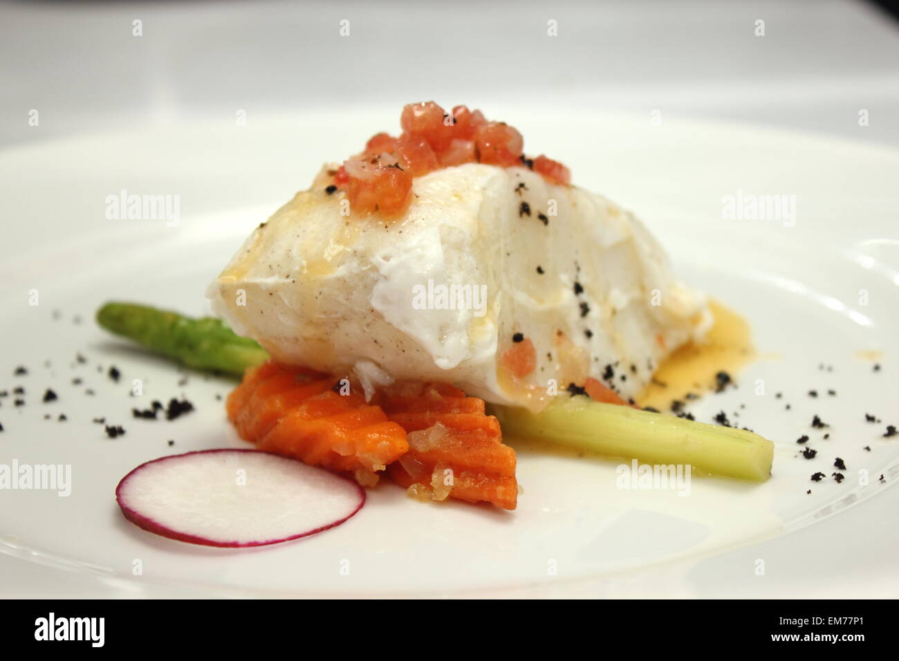 Gourmet Main Entree Course Grilled Snow Fish with white sauce Stock ...