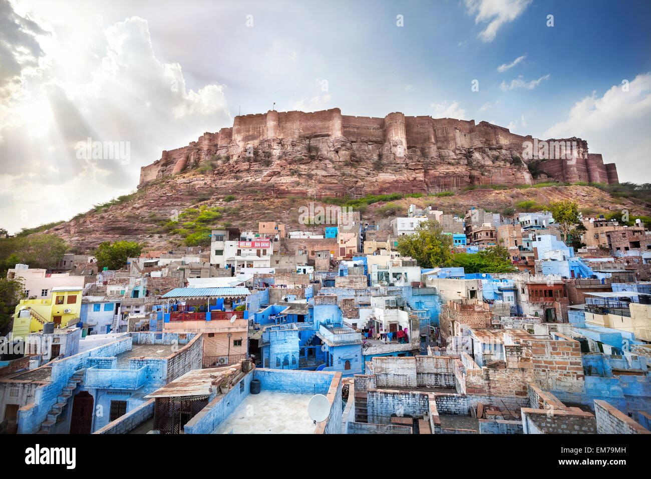 Blue city and Mehrangarh fort on the hill at sunset sky in Jodhpur, Rajasthan, India Stock Photo