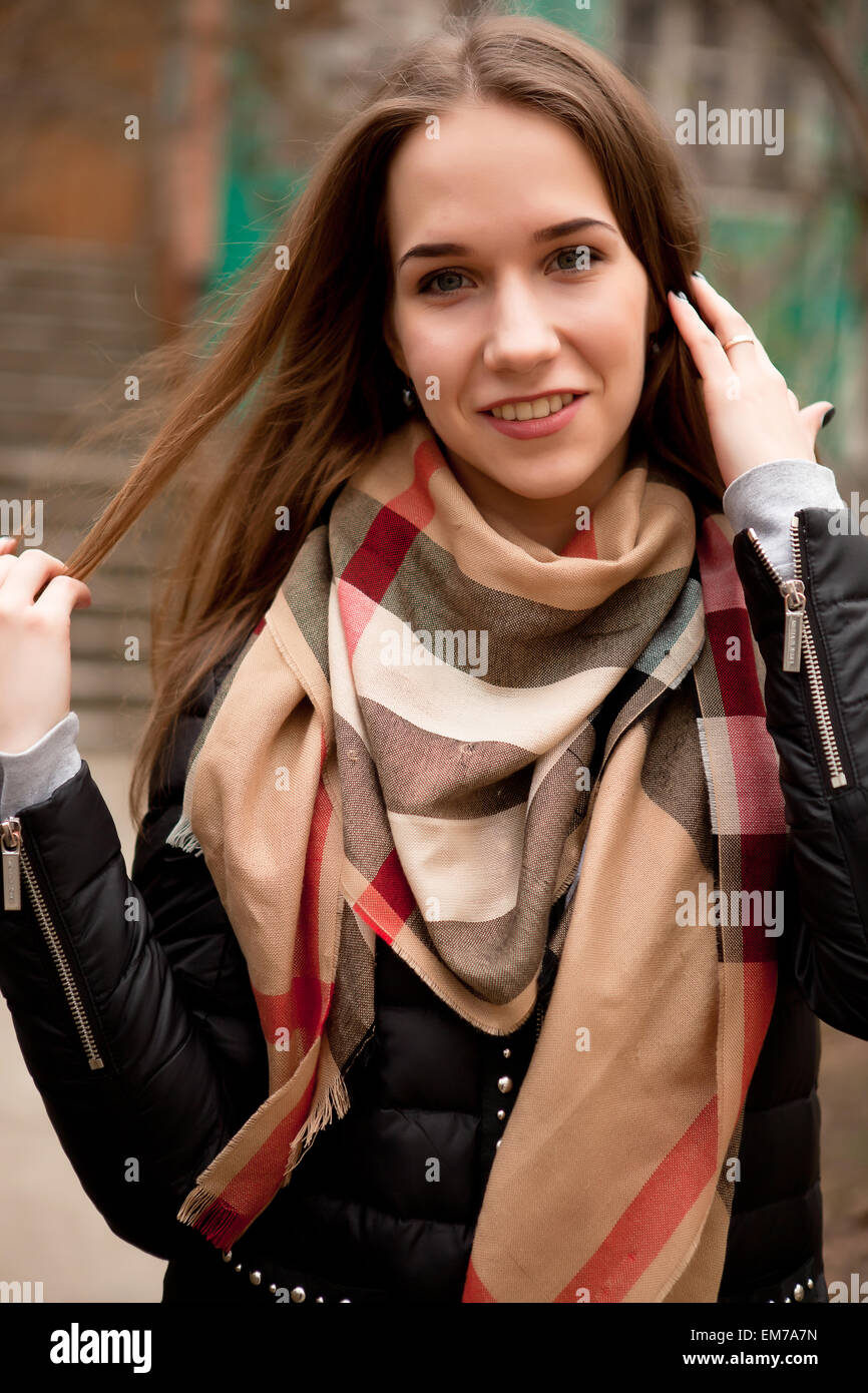 Beautiful young girl smiling at camera outshide shooting Stock Photo ...
