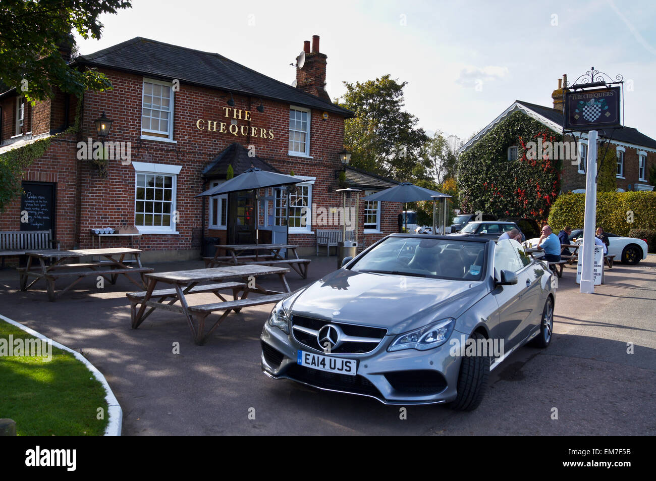 Mercedes parked outside The Chequers pub, Matching Green, Essex