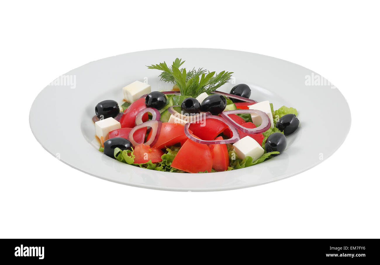 Salad with olives, sweet peppers and feta cheese on an isolated background Stock Photo