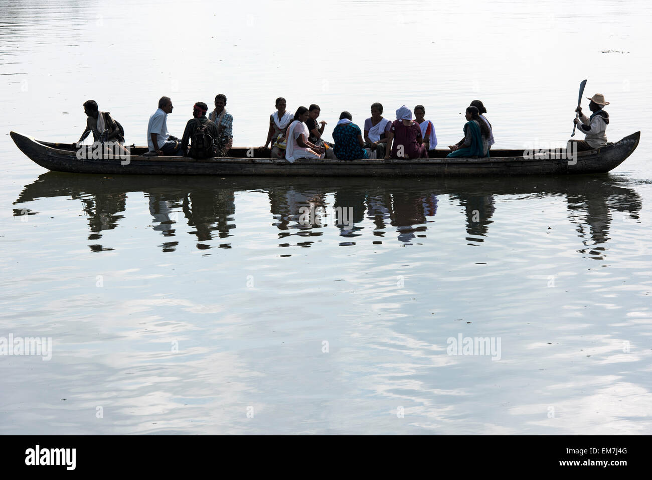 Small boat with passengers, Backwaters canal system in Alappuzha, Kerala, India Stock Photo