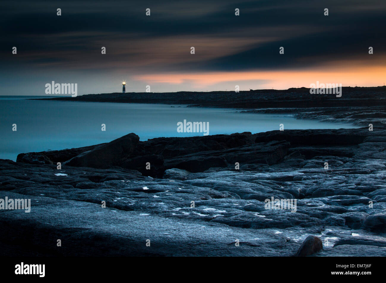 Lighthouse by the coast, Inis Oirr, Aran Islands, Ireland Stock Photo