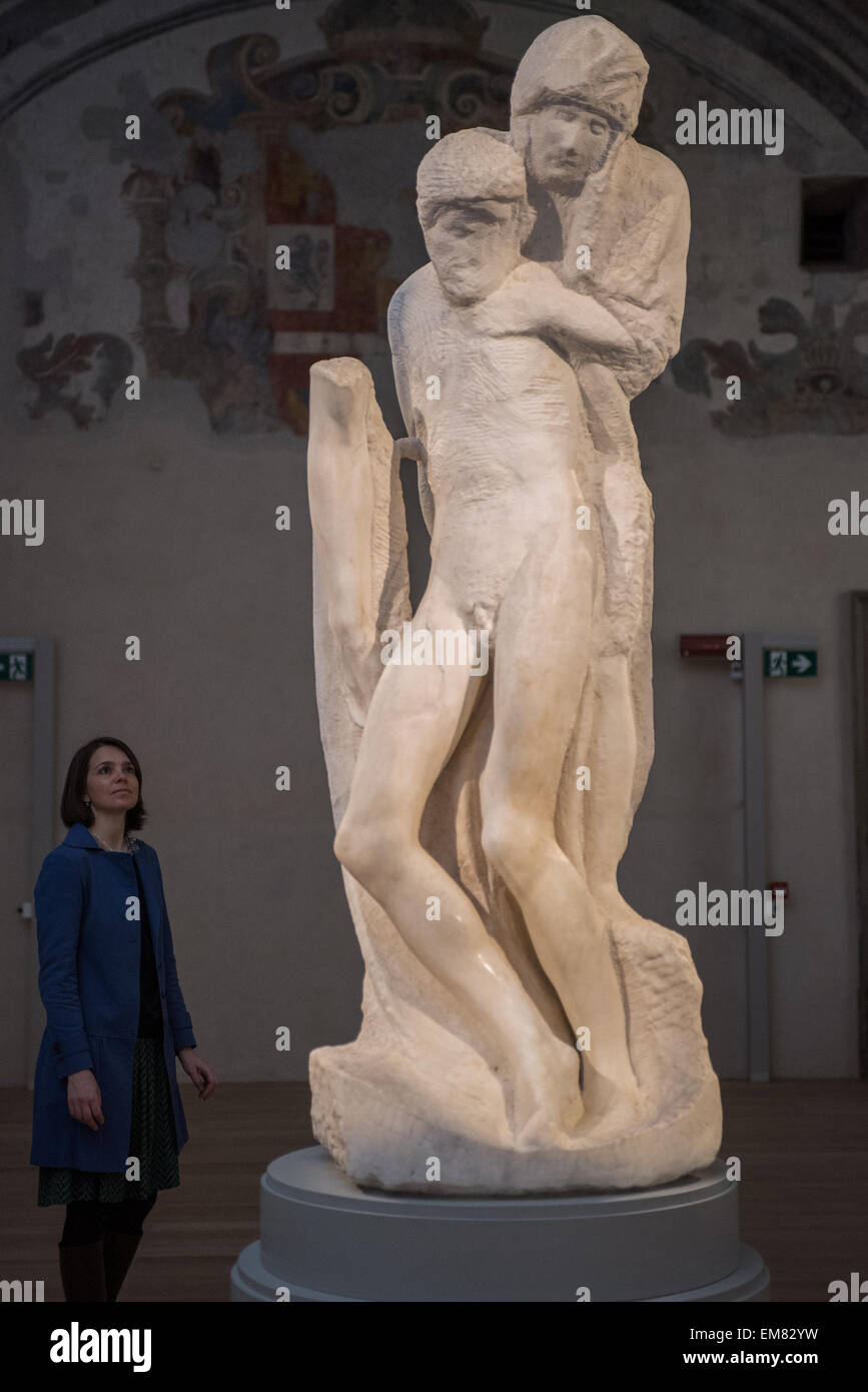 Milan, Italy. 17th Apr, 2015. a visitor looks up at Michelangelo's Pietà Rondanini at the new museum at the newly restored Ospedale Spagnolo of Castello Sforzesco Credit:  Piero Cruciatti/Alamy Live News Stock Photo