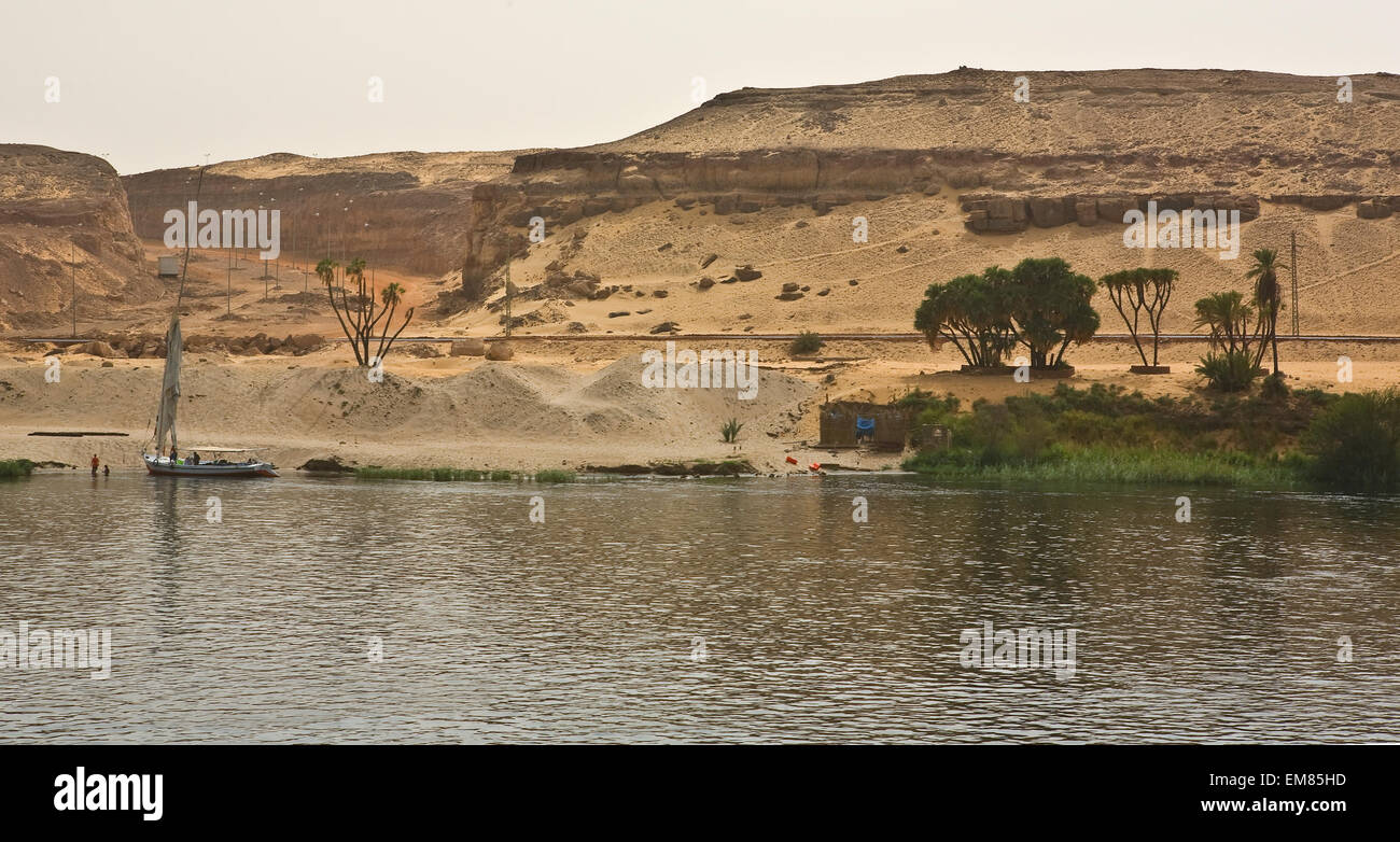 Life on river Nile in Egypt with a felucca, close to Aswam dam Stock Photo
