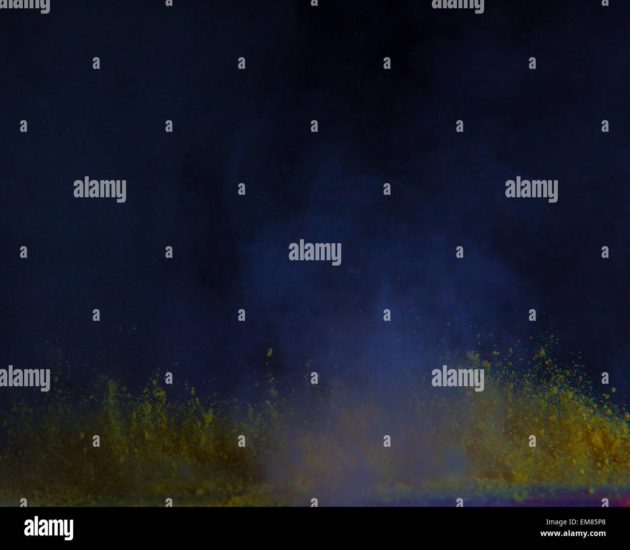 yellow paint explosions Stock Photo - Alamy